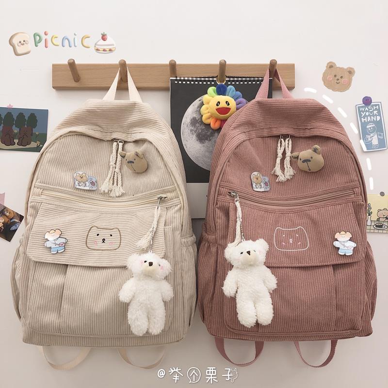 กระเป๋าเป้สะพายหลัง ผ้าลูกฟูก ลายทางน่ารัก เข้ากับทุกการแต่งกาย สไตล์เกาหลี แฟชั่นฮาราจูกุ สําหรับผู้หญิง และนักเรียนมัธยมปลาย