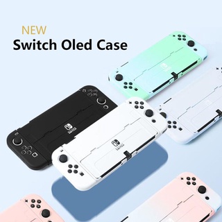 เคส Nintendo Switch OLED อุปกรณ์เสริมคอนโซลเกม ฝาครอบป้องกันสวิตช์ ป้องกันรอยขีดข่วน ที่ถอดออกได้ ชุดเปลือกนอก เหมาะสําหรับ OLED รุ่น ป้องกันการตก เคสแข็ง ที่วางขาตั้ง ปรับได้