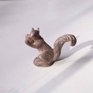 mininature squirrel is holding walnut กระรอกจิ๋ว ตุ๊กตาจิ๋วตกแต่งบ้าน