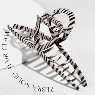 Femme.material - Zebra solid hair claw