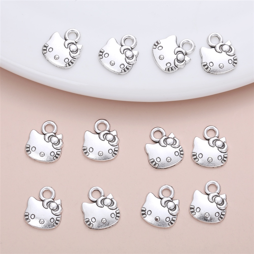 50 ชิ้น/เซ็ตที่ละเอียดอ่อน Lovly Hello Kitty อุปกรณ์เสริม Charm สําหรับผู้หญิงส่วนบุคคล DIY เครื่องประดับทําสร้อยคอจี้