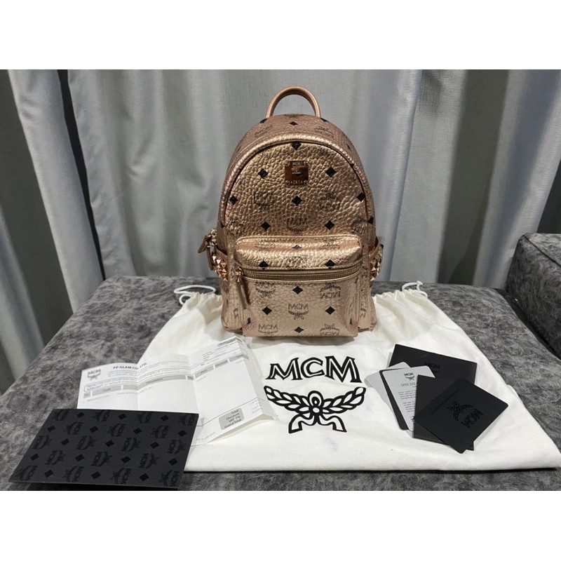 กระเป๋าเป้ MCM MINI BACKPACK สีโรสโกว สีนี่limited อะไหล่ก็สีโรสโกว มือสอง ของแท้ มีใบเสร็จออกช็อปพา