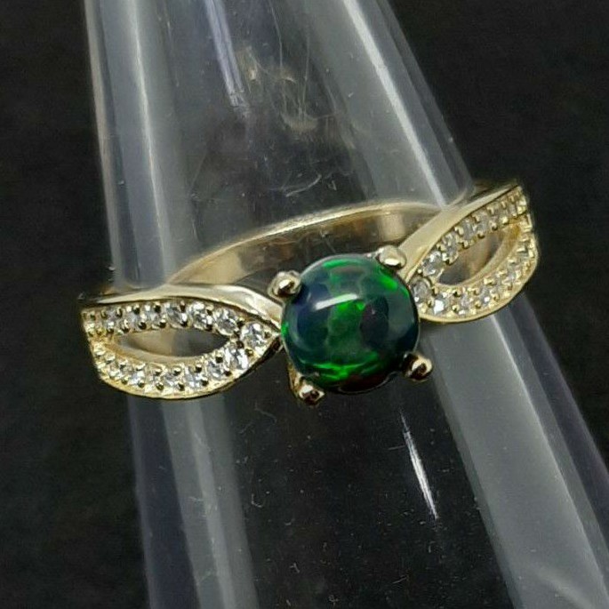 แหวน แบล๊คโอปอล Black Opal พลอยแท้ ทรงกลม ขนาด 6 มม.ตัวเรือนเงินแท้ 925 ชุบทอง ขนาด 58