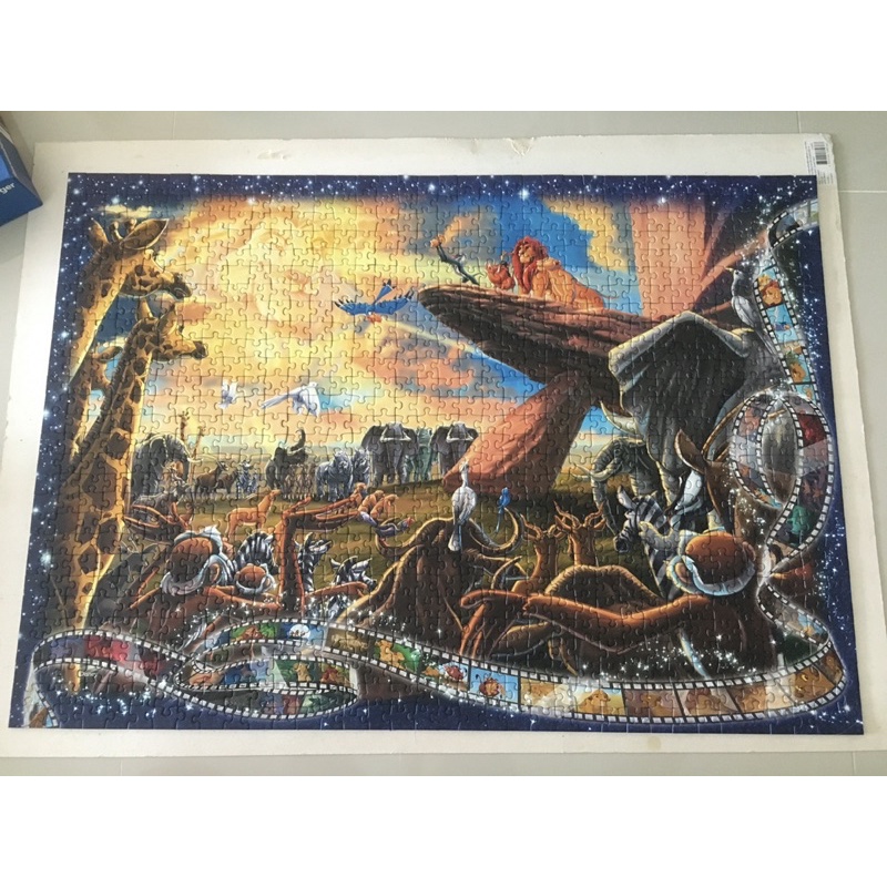 จิ๊กซอว์ Ravensburger Lion King 1,000 ชิ้น (มือสองต่อครั้งเดียว)