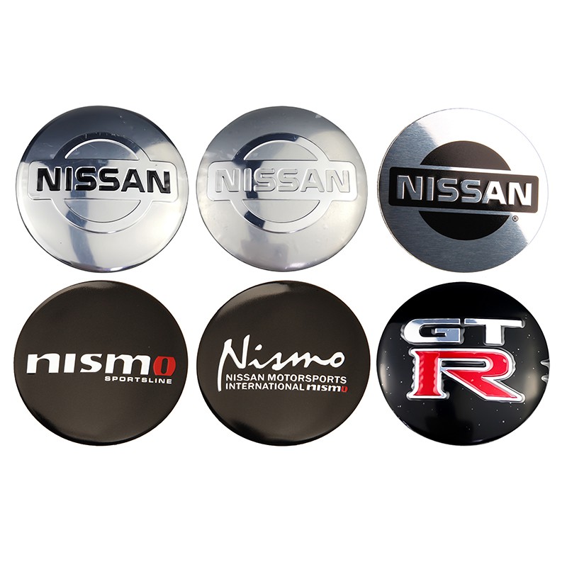 56 มม.4PCS Nissan Nismo GTR X-Trail Qashqai Tiida Altima Sentra รถล้อ Center Hub Cap สติกเกอร์ป้ายสัญลักษณ์ Decal