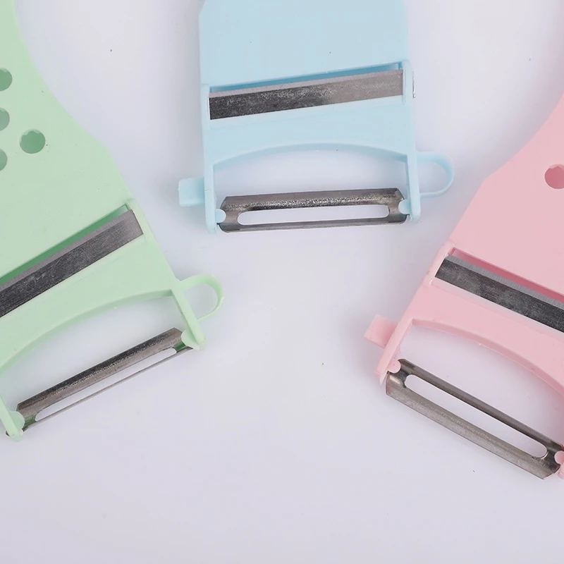 RAINBEAU 5-in-1 มีดอเนกประสงค์ ไอเท็มคู่ครัว ที่สไลด์ ตัด ซอย หั่น ปอก ผัก ผลไม้ ขูดมะละกอ (คละสี) thumbnail 8