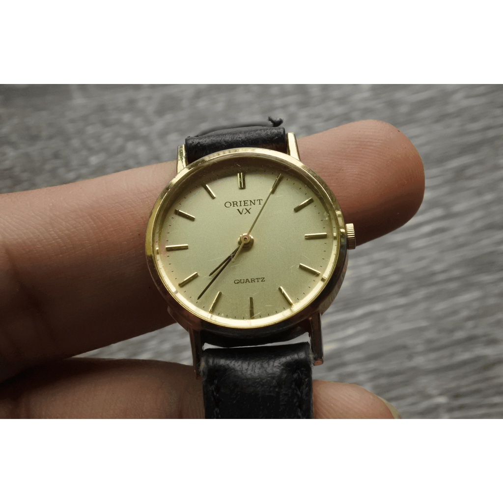 นาฬิกา Vintage มือสองญี่ปุ่น ORIENT VX ระบบ Quartz ผู้หญิง ทรงกลม กรอบทอง หน้าทอง หน้าปัด 24mm