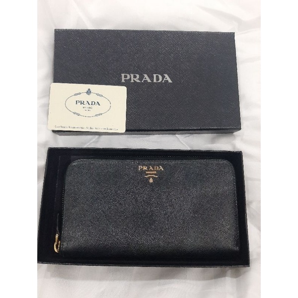 กระเป๋าสตางค์ใบยาว PRADA สีดำ แท้ มือ2 สภาพ 75%