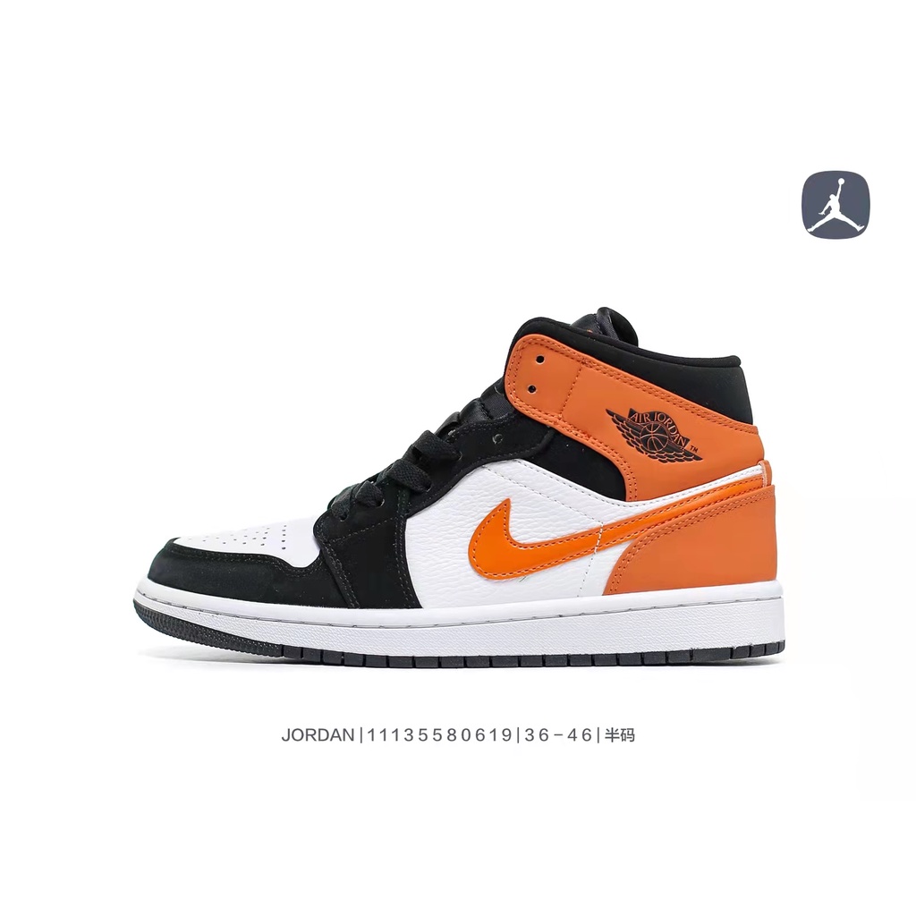 black orange jordan 1s