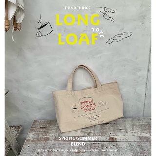 T&amp;THINGS. LONG LOAF TOTE 🥖🥖🥖 กระเป๋าผ้าแคนวาสหนาสกรีนลาย จุของหนักได้ดี