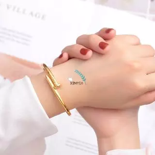 🔥XINYIA🔥กำไลข้อมือเหล็กไทเทเนียม รูปตะปู แฟชั่นเกาหลี สำหรับผู้หญิง 2024