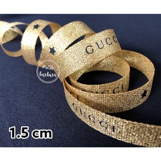 ริบบิ้นGuc ci สีทอง ของแท้ ขนาด 1.5 cm พิมพ์ลายอักษรสีดำ ริบบิ้นห่อของขวัญ