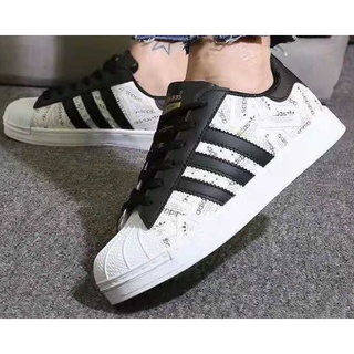 รองเท้า Addidas ผู้ชายและผู้หญิง รองเท้าแฟชั่น พื้นหนา ใส่สบาย รองเท้ากีฬาผู้ชาย