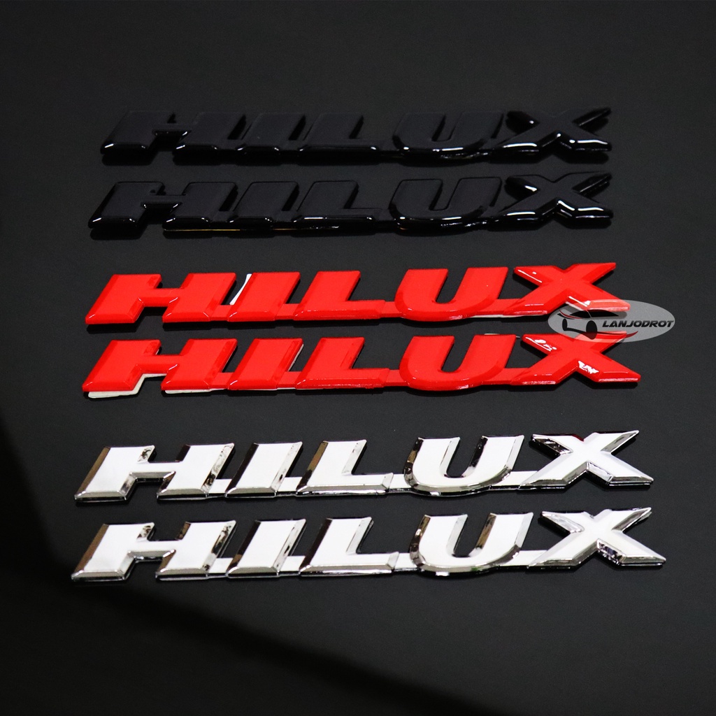 โลโก้ HILUX ตัวอักษร ตัวนูน ขนาด 1.8 x 16.5 cm. สำหรับ TOYOTA HILUX TIGER ไฮลักซ์ ไทเกอร์