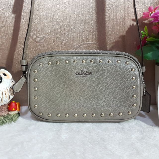 COACH F24399 CROSSBODY POUCH WITH LACQUER RIVETS 
Color: SILVER/FOG