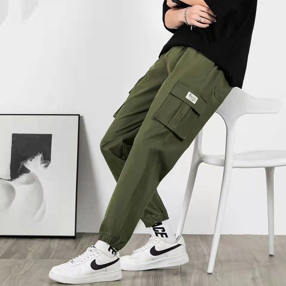 ชุดหลวม ๆ ของผู้ชายเป็นกางเกงขายาวเอวสูงขาจั๊มบุคลิกภาพสตรีทแฟชั่นเกาหลี (รหัส9215)