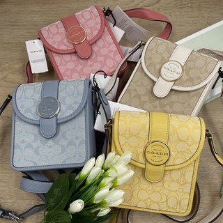 (ผ่อน0%) กระเป๋าสะพายข้าง NORTH/SOUTH LONNIE CROSSBODY IN SIGNATURE JACQUARD (COACH C8321) ลายซี สีฟ้า ชมพู เหลือง