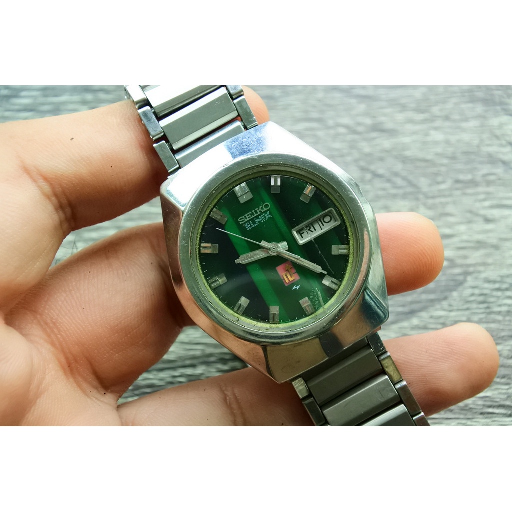 นาฬิกา Vintage มือสองญี่ปุ่น SEIKO ELNIX ระบบ AUTOMATIC QUARTZ ผู้ชาย ทรงกลม กรอบเงิน หน้าปัดสีเขียว หน้าปัด 21mm