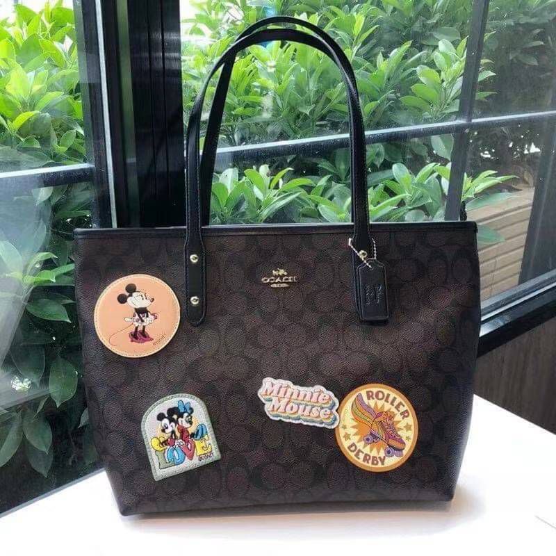 กระเป๋า Coach City Disney X Minnie Mouse Patches Signature Coated Canvas Tote Bag แท้💯 ส่งฟรี