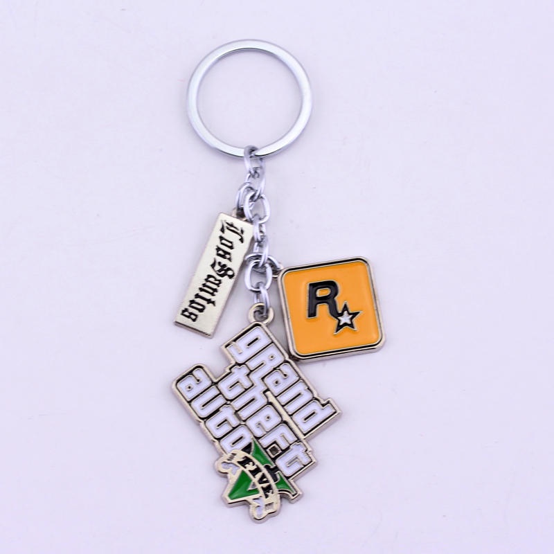 12pcs เกมเครื่องประดับ PS4 GTA 5 พวงกุญแจ Grand Theft Auto 5 Key Chain สําหรับชายแฟน PC Rockstar พวง