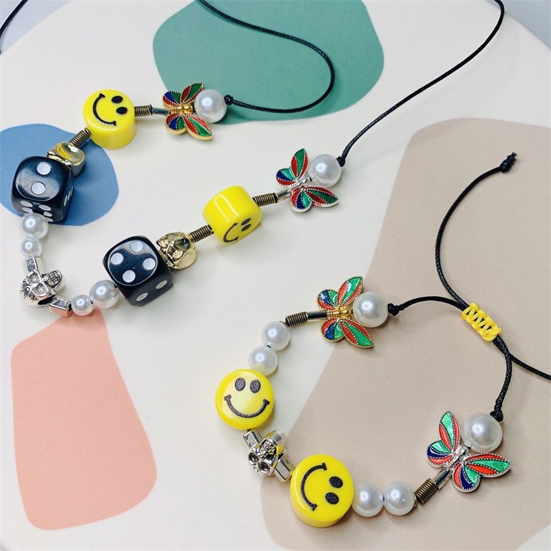 ASAP rocky Wu Yifan สร้อยคอเดียวกัน hip hop บุคลิกภาพลูกเต๋าเพิร์ลผีเสื้อ skull สร้อยคอหน้ายิ้ม