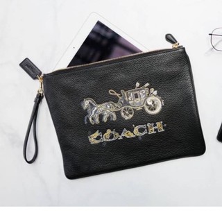 (ผ่อน0%) กระเป๋าคลัตช์ LARGE WRISTLET 30 WITH CHELSEA ANIMATION (COACH F78048) หนังแท้ สีดำ ลายรถม้า