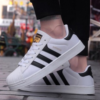 Adidas Super Star ขาว-ดำ ตัวTop รองเท้าผ้าใบ สุดคลาสสิค ส่งฟรี!! รับประกันสินค้าทุกกรณี พร้อมอุปกรณ์ของแถมเพียบ!!