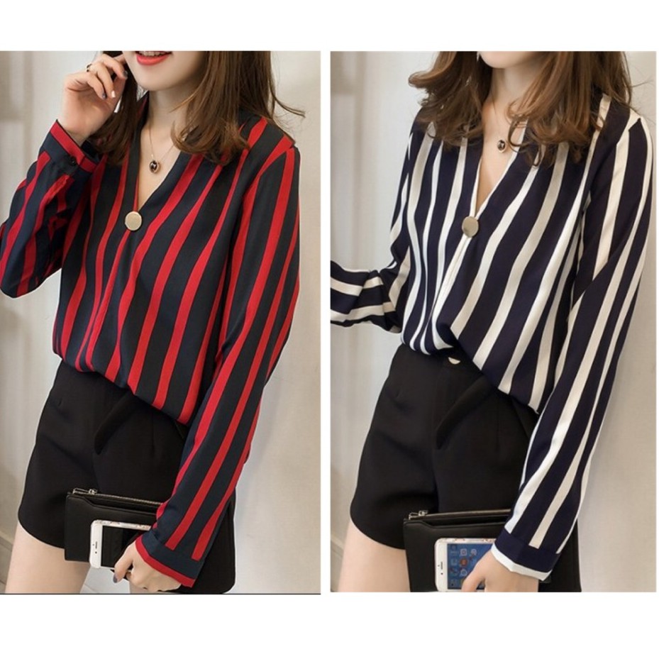 เสื้อเชิ้ตลายริ้วตั้ง แต่งกระดุมที่คอวี