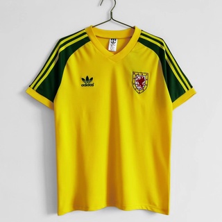 เสื้อกีฬาแขนสั้น ลายทีมชาติฟุตบอล Wales away 1982 ชุดเยือน สไตล์เรโทร