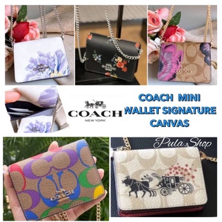 กระเป๋าสตางค์พร้อมสายสะพาย COACH  MINI WALLET SIGNATURE CANVAS