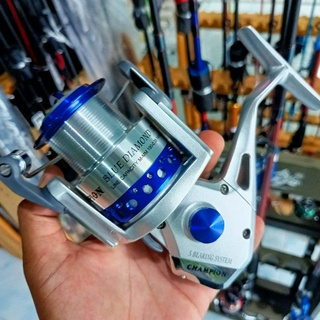 รอกสปิน Champion Blue Diamond เบอร์ 5000 (ตัวท๊อป) แขนเกลียว บอดี้โลหะทั้งตัว ลูกปืนสแตนเลส 5+1ตลับ พร้อมซีลกันน้ำ