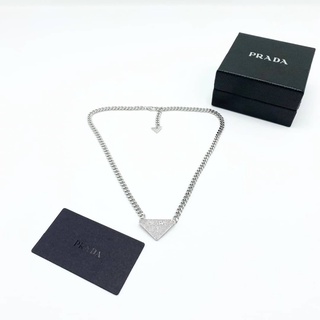 PRADA STERLING SILVER TRIANGLE LOGO SYMBOL NECKLACE เครื่องประดับ สร้อยคอปราด้า สามเหลี่ยมโลโก้สีเงิน ประดับคริสตัล