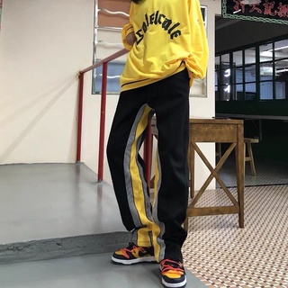 กางเกงแฟชั่น ผู้ชาย yellow track pant เอวยางยืด ขายดี กางเกงวอมดำ hot sale