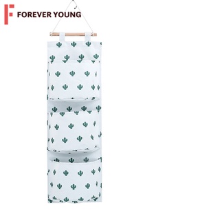 TForever Young-ถุงผ้าแยกของแขวนผนัง ถุงแขวนอเนกประสงค์ รุ่น LC-019 ทำจากผ้าแคนวาส มี 3 ช่องใส่ของ