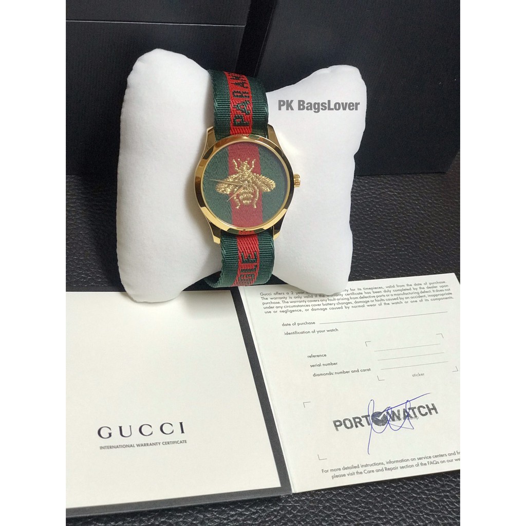 นาฬิกาสายเขียวแดง ผึ้งทอง Gucci รุ่น YA126487A หน้าปัดผึ้งทอง ขอบทอง ปัด 38 mm