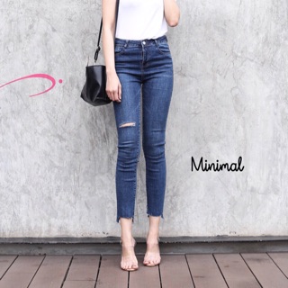 High-waist jeans with rips