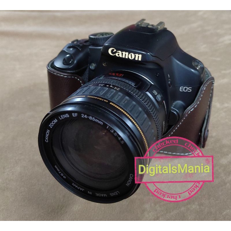 เคสหนัง แบบครึ่ง พร้อมสายคล้องคอ สําหรับ Canon EOS 450D 500D 550D 600D 650D