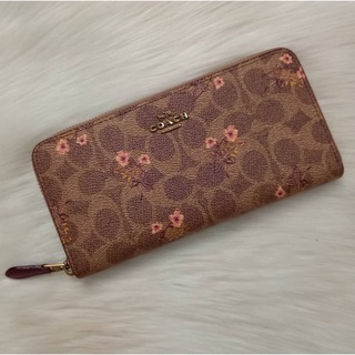 กระเป๋าสตางค์ใบยาว ซิปรอบ COACH ACCORDION ZIP WALLET IN SIGNATURE CANVAS WITH FLORAL BOW PRINT