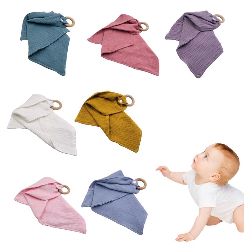 baby chewing on pacifier teething