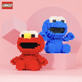 เลโกตัวต่อKawsเอ็มโมสีฟ้า+แดงแบบนั่งเป็นเฟื่องมี2แบบ