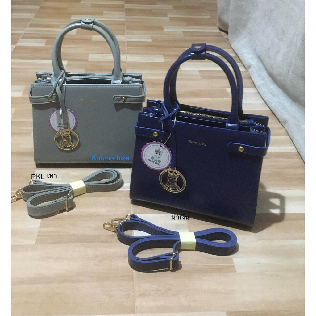 Richy girl กระเป๋าทรงเคลลี่ ทรงถือ/สะพายข้างได้ หนังเรียบ ขนาด 9 นิ้ว พร้อมสายหนัง ปรับระดับได้ 1 เส