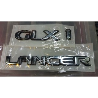 พลาสติกชุบโครเมี่ยม คำว่า LANCER หรือ GXLi