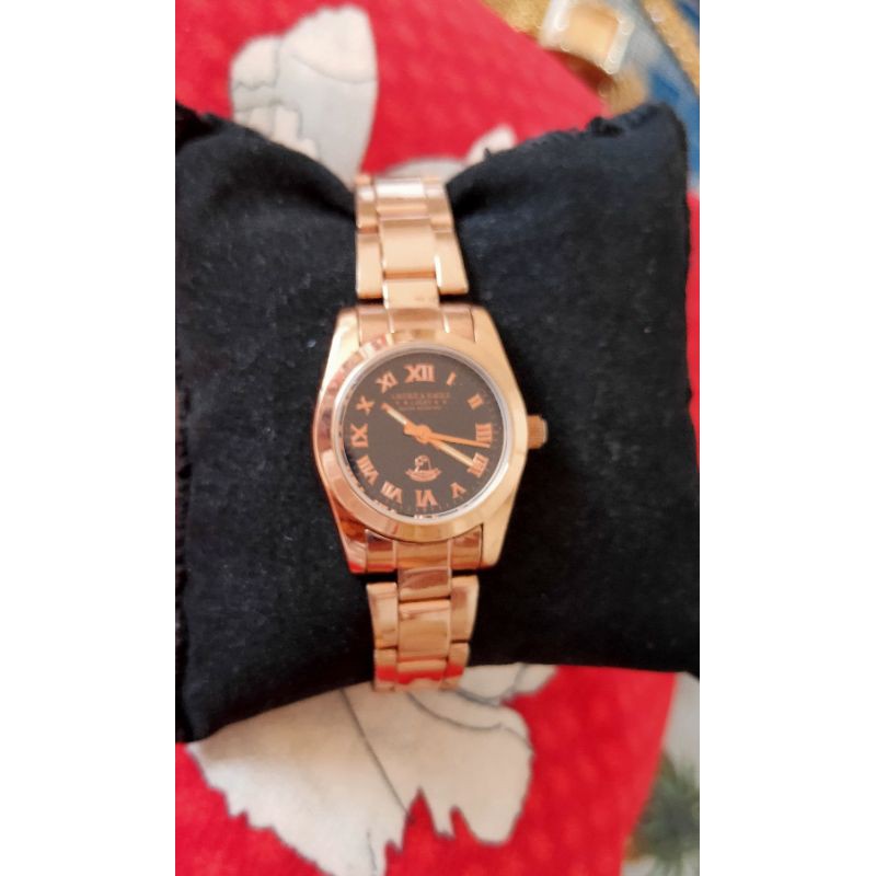 นาฬิกาแบรนด์เนม america eagle ตัวเรือนสี pink gold หน้าปัดสีดำ สายสแตนเลสของแท้มือสองสภาพสวย