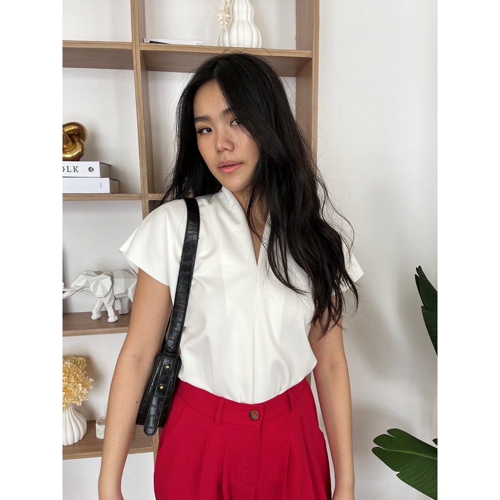 NYLA - เสื้ออําพัน**