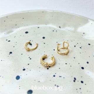 donut earring - gold by Bluebox.jpg