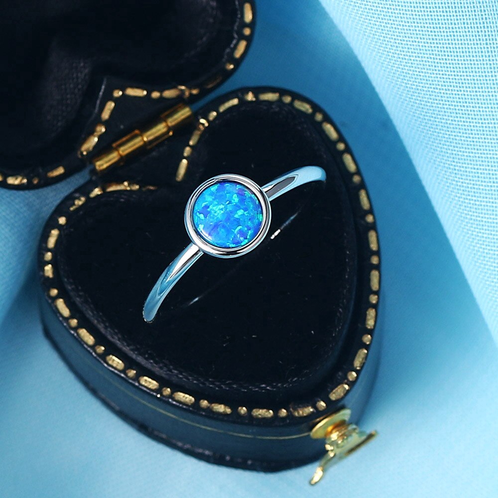 ZHOUYANG แหวนหินโอปอลสำหรับผู้หญิงที่เรียบง่ายคลาสสิกรอบ White Gold พรรคสีของขวัญวันเกิดสำหรับสาวแฟชั่น Jeweley DZR032