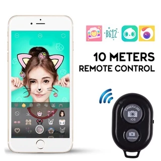 คลังสินค้าพร้อม Bluetooth Shutter Release Remote สําหรับโทรศัพท์/แล็ปท็อป/แท็บเล็ต/PC Mini Wireless Camera Shutter พร้อมแบตเตอรี่ฟรี