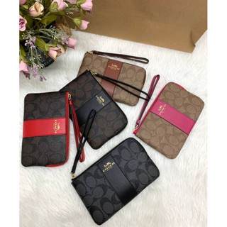 กระเป๋าถือ กระเป๋าคล้องมือ 58035 CORNER ZIP WRISTLET IN SIGNATURE BAG