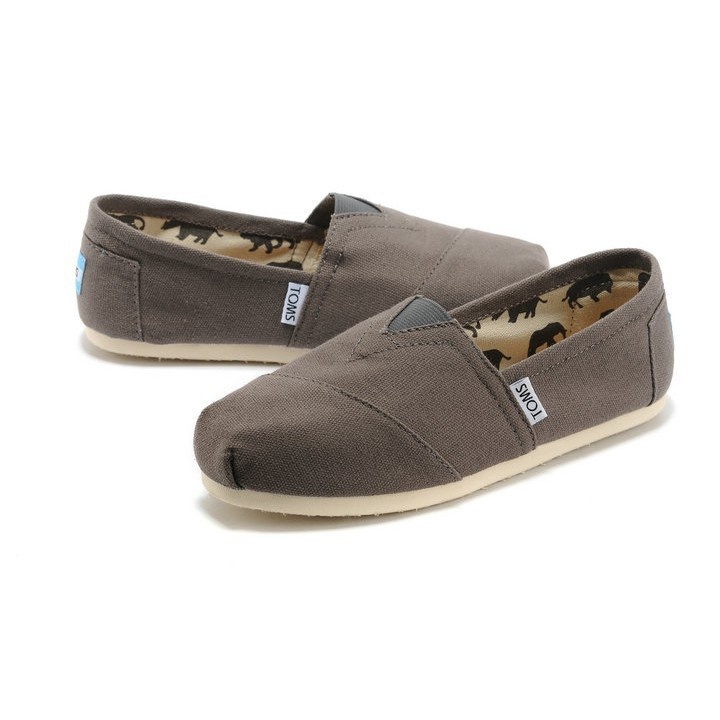 Toms  รองเท้าผ้าใบลําลอง ส้นแบน ลายทาง สีฟ้า สําหรับผู้ชาย ผู้หญิง