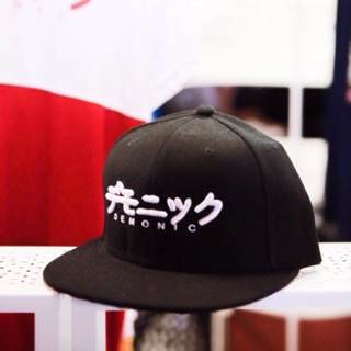 DEMONIKKU WHITE ON BLACK SNAPBACK